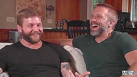 Two Cheerful Bears Making Out On A Couch